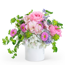 Pink and white mixed bouquet in a white vase