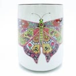 Decorative butterfly design on a white cylindrical container