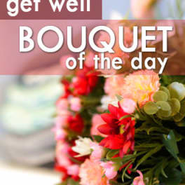 Bouquet of pink and red flowers with green foliage