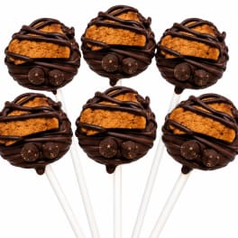 Chocolate-covered rice crispy treats on white sticks