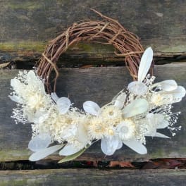 White floral wreath on a twig ring