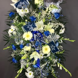 Dallas Cowboys-themed standing floral spray with blue and white flowers