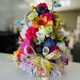 Colorful mixed bouquet with a gold ribbon bow