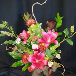 Autumn mix with lilies and kiwi branches