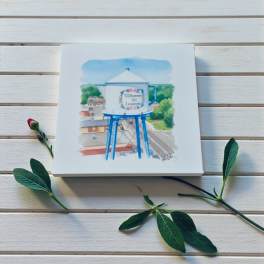 Watercolor painting of a blue water tower on a white canvas