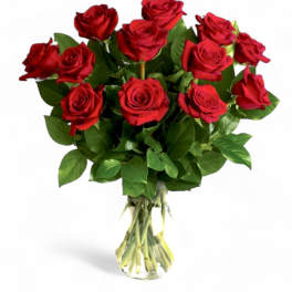 Bouquet of red roses in a clear glass vase
