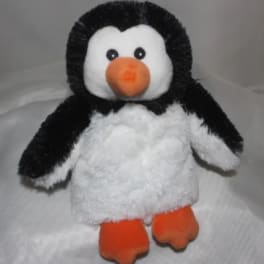 Plush penguin toy with black, white, and orange coloring