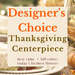 Text for a designer's choice Thanksgiving centerpiece over a blurred fall table setting.