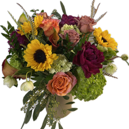 Mixed bouquet with sunflowers, roses, and hydrangeas in a vase