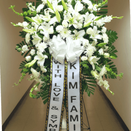 [TT-SPRAY33] GRAND SYMPATHY SPRAY IN WHITE WITH 2 PRINTED VERTICAL BANNERS BY TWIN TOWERS FLORIST, ARLINGTON VA