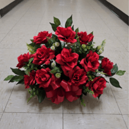 Red rose arrangement with a red ribbon bow