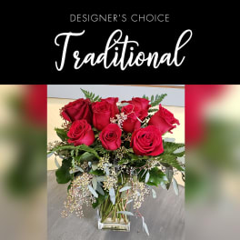 Bouquet of red roses in a clear glass vase