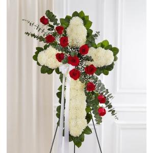 Cross-shaped floral standing spray with red roses and white blooms