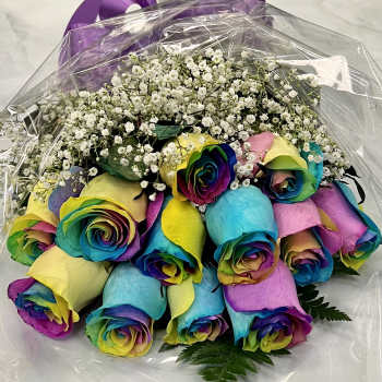 Bouquet of rainbow-colored roses with white baby's breath