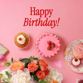 Birthday greeting with cupcakes and a bouquet of orange and white flowers