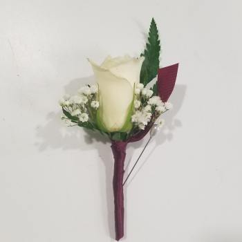White rose boutonniere with baby's breath and burgundy ribbon