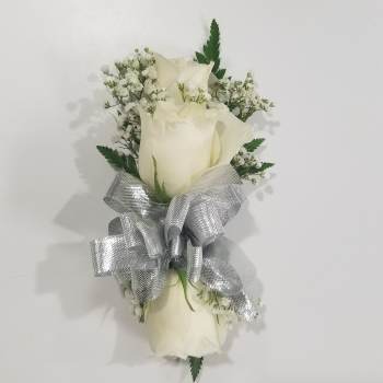 White rose bouquet with baby's breath and a silver ribbon