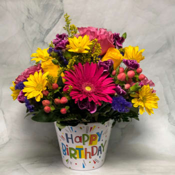 Bright mixed flower bouquet in a birthday pot