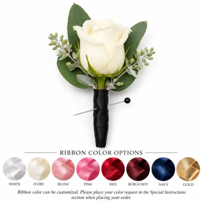 White rose boutonniere with black ribbon wrap and green leaves