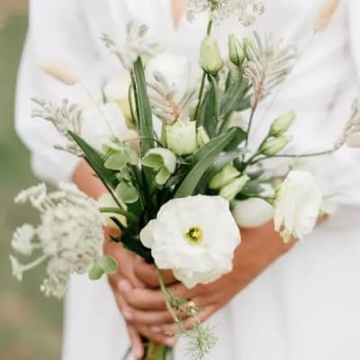 White bouquet with green buds and airy filler flowers