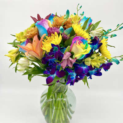 Colorful mixed bouquet in a clear glass vase