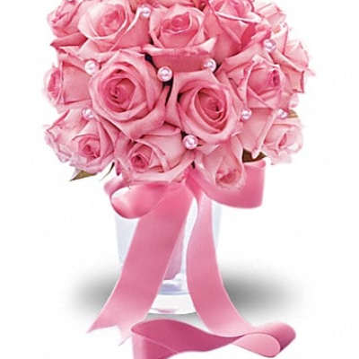 Pink rose bouquet with pearl accents in a clear vase