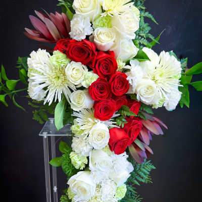 Standing floral spray with red and white roses and white chrysanthemums