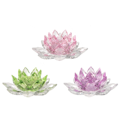 Three crystal lotus-shaped candle holders in pink, green, and purple