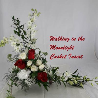 Red and white floral casket insert with long white blooms