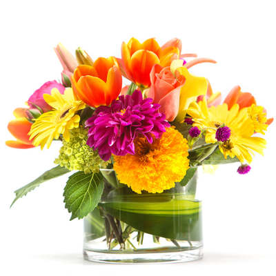 Bright mixed bouquet in a clear glass vase