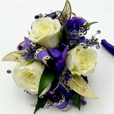White rose bouquet with purple ribbon and gold butterfly accents