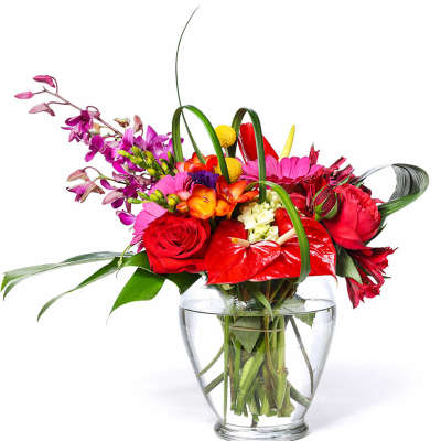 Colorful mixed bouquet in a clear glass vase