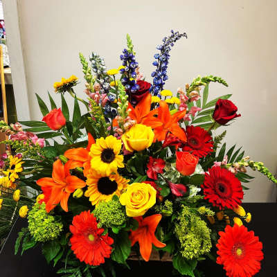 Bright mixed bouquet with roses, lilies, gerbera daisies, and snapdragons