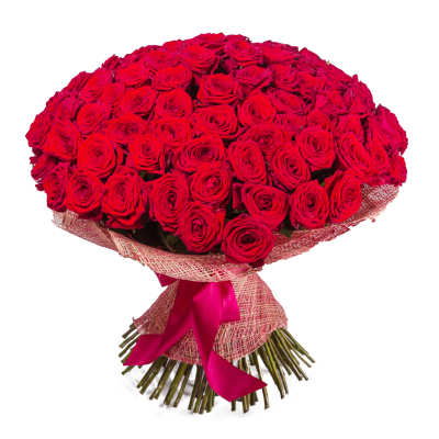 Large bouquet of red roses wrapped in pink mesh with a satin ribbon