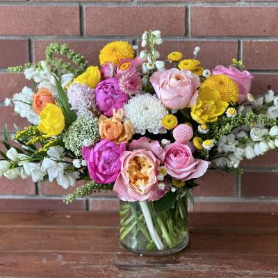 Colorful mixed bouquet in a clear glass vase