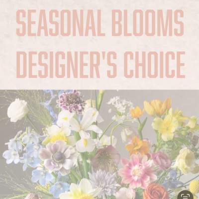 Graphic with text Seasonal Blooms Designer's Choice over a pastel mixed flower arrangement