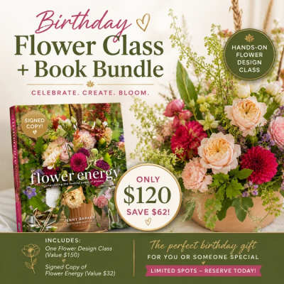 Flower arrangement beside a book and birthday class promo text