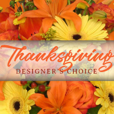 Thanksgiving designer's choice floral arrangement with orange and yellow blooms