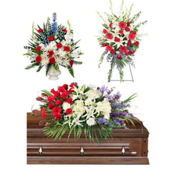 Floral casket spray with red, white, and purple flowers