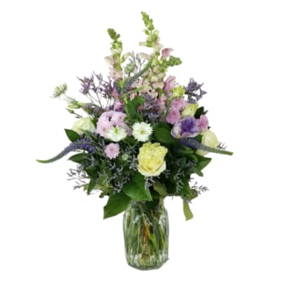 Mixed pastel bouquet in a clear glass vase