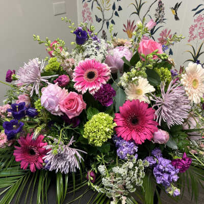 Large mixed bouquet with pink, purple, and white flowers