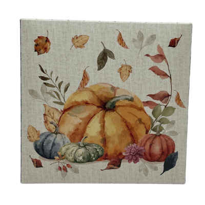 Fall pumpkin wall art with leaves and a small flower