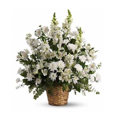 White floral arrangement in a woven basket