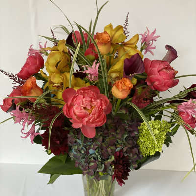 Colorful mixed bouquet in a clear glass vase