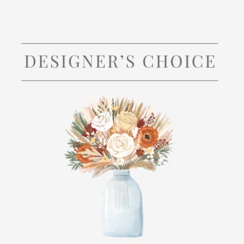 Mixed bouquet of cream and orange flowers in a blue vase