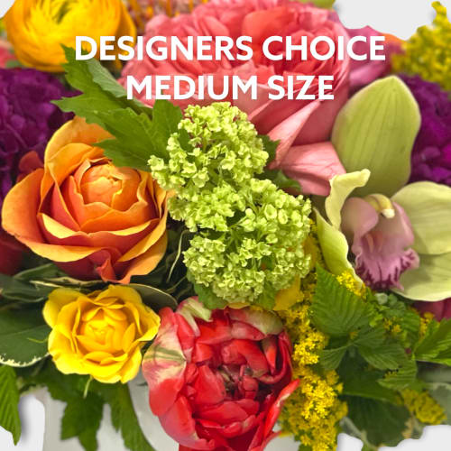 Mixed bouquet with roses, orchids, and bright filler flowers