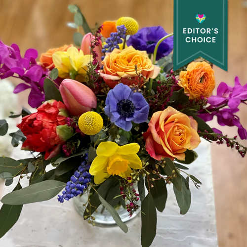Colorful mixed flower bouquet in a glass vase
