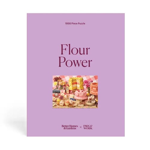 Lavender puzzle box with the words Flour Power and a small dessert scene