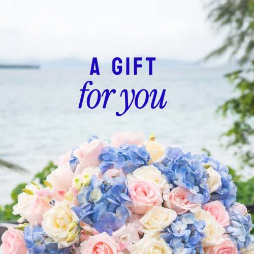 Bouquet of pink and white roses with blue hydrangeas