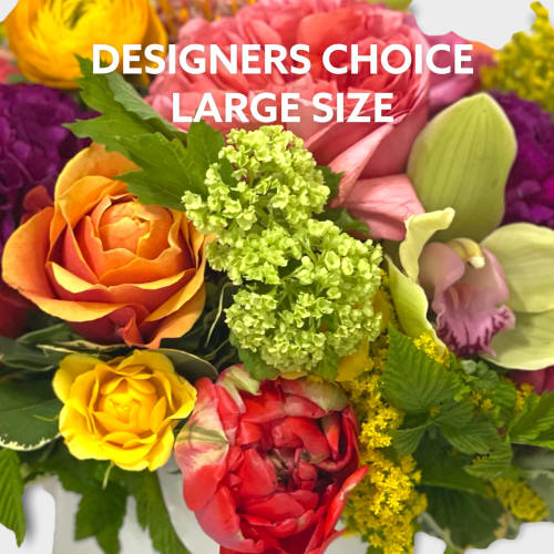 Large mixed bouquet with roses, orchids, and bright filler flowers